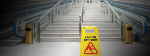 Caution sign in front of staircase